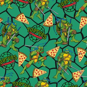 May include: A green fabric pattern featuring Teenage Mutant Ninja Turtles characters with blue masks and swords, slices of pepperoni pizza, and black turtle shell outlines. The text TORTUES is printed in green over black shell graphics.