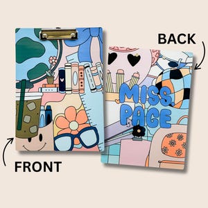 May include: A colorful clipboard with a whimsical design featuring a coffee cup, glasses, flowers, books, and the text "Miss Page". The front of the clipboard has a smiley face and the back has a checkered pattern.