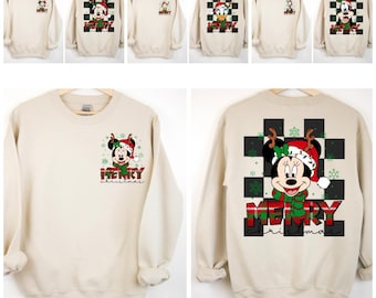 May include: Cream-colored sweatshirts with various cartoon character designs, including Mickey and Minnie Mouse, for Christmas. Each sweatshirt features a "Merry Christmas" graphic, with some designs on the front and others on the back.