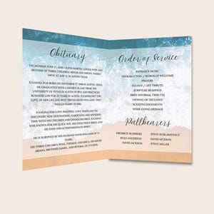 May include: A folded funeral programme featuring a beach-themed design with blue ocean waves and white sea foam at the top and a tan sandy shore at the bottom. The text includes sections for Obituary, Order of Service, and Pallbearers.