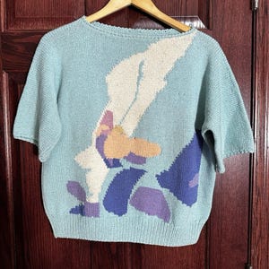 Suéter vintage de los 80, tejido de punto floral con intarsia de iris, corte holgado, manga corta, color menta y verde mar.