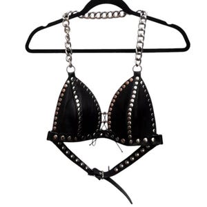 Studded Black Leather Bra, Punk Rock Festival Top festivals, concerts, gothic fashion, stud detailing, chain straps, and a lace up front