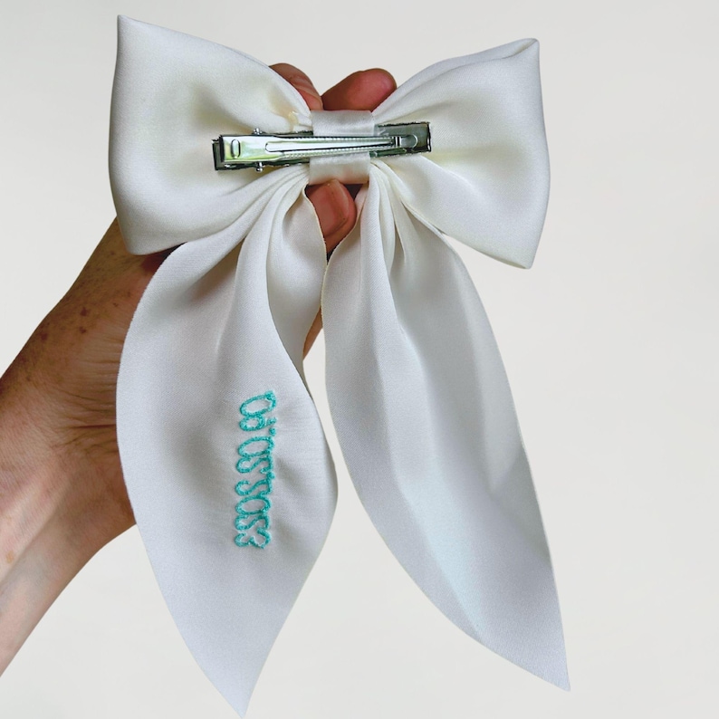 til death embroidered bow with wedding date
embroidered bow for bachelorette party
bride shower accessory hair bow
til death do us party bridal bow
edgy bridal hair accessory
Turn on screen reader support