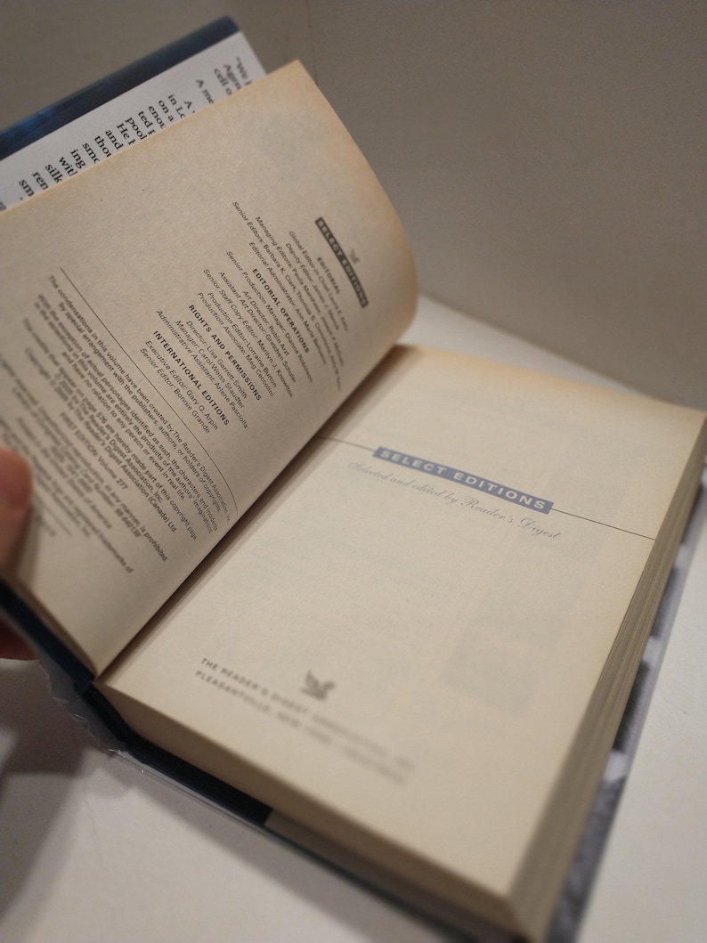 May include: A close-up of the copyright and editorial information page from a book. The page lists the names of the editorial staff and the publishing company, Reader's Digest.