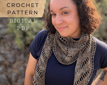 May include: A woman wearing a brown and tan crochet shawl with an openwork design. Text on a tan banner reads "CROCHET PATTERN DIGITAL PDF". The woman is wearing a dark blue top. The shawl is a triangular shape.