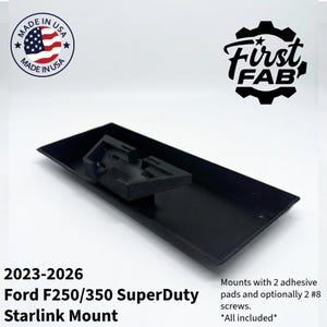 May include: A black Starlink mount for Ford F250/350 SuperDuty trucks, model years 2023-2026. The mount includes adhesive pads and screws for installation. The product is made in the USA and features the "First FAB" logo.