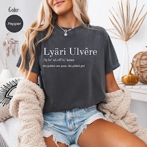 Lyäri Ulvêre, Gildy Goldfinch, Comfort Colors® Plated Prisoner Series, Auren x Slade Ravinger, Raven Kennedy Merch, Fantasy Booktok Tee