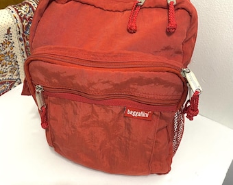 Vintage  Baggallini burnt Orange Distressed Canvas sling backpack bag