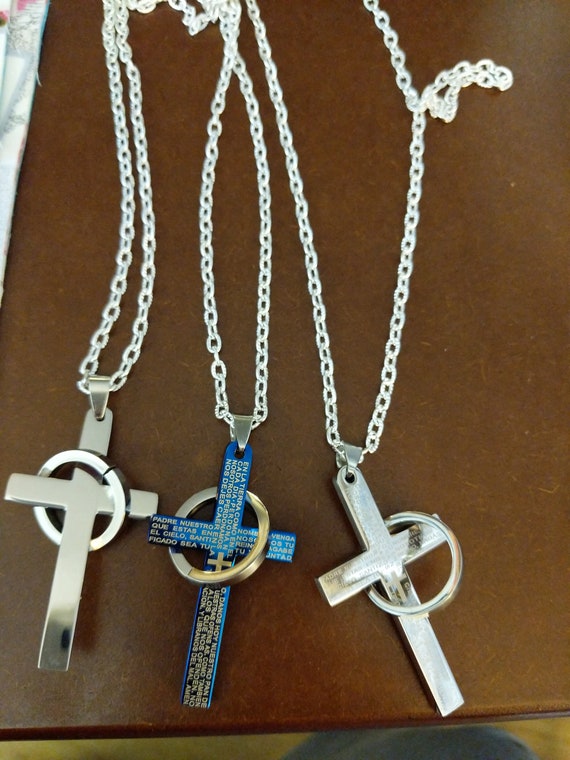 Clearance Item Cross with a Ring around it Necklace Four to