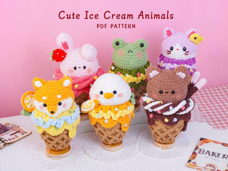 May include: Six crocheted plush toys shaped like animals in ice cream cones, including a fox, rabbit, frog, cat, bear, and bird. The text "Cute Ice Cream Animals PDF PATTERN" is displayed at the top. Each figure features colorful yarn details.