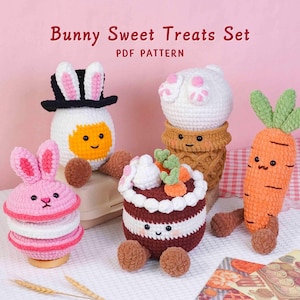 May include: A collection of crocheted Easter-themed treats, including a bunny-shaped cake, a carrot, and an egg with a bunny hat. The text "Bunny Sweet Treats Set PDF Pattern" is displayed on a pink background.