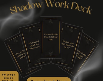 May include: A black and gold deck of cards with the text "Shadow Work Deck" and "Download Now" on the front. The cards feature prompts for self-reflection and shadow work.