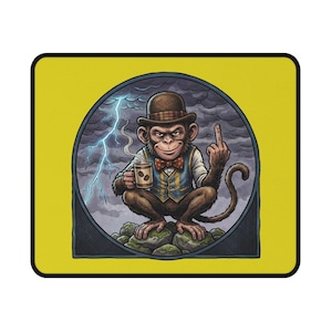 May include: A mouse mat with a cartoon monkey wearing a bowler hat, waistcoat, and bow tie, holding a coffee mug and giving the middle finger. The background shows a stormy sky with lightning, set within a circular frame on a yellow background.