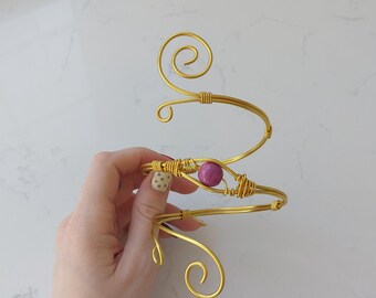 Gold and purple spiral arm cuff