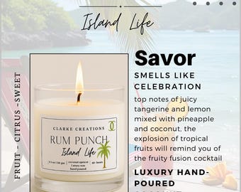 May include: A lit candle in a clear glass jar, labelled "Rum Punch Island Life". The candle is hand-poured and made with coconut apricot wax. The scent is described as a celebration with notes of tangerine, lemon, pineapple, and coconut.
