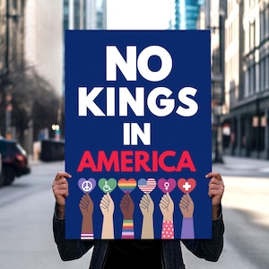 May include: A person holding a blue sign with the words "NO KINGS IN AMERICA" in white. Below, hands of various skin tones hold heart-shaped signs with symbols including a peace sign, wheelchair, rainbow, American flag, and others.