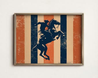 May include: A framed print featuring a vintage-style illustration of a cowboy riding a bucking bronco. The artwork is set against a background of vertical stripes in shades of orange, navy blue, and beige, with a distressed, aged appearance.