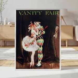 The large-scale Vanity Fair poster acting as a statement piece in a sophisticated living room with dark, dramatic decor.