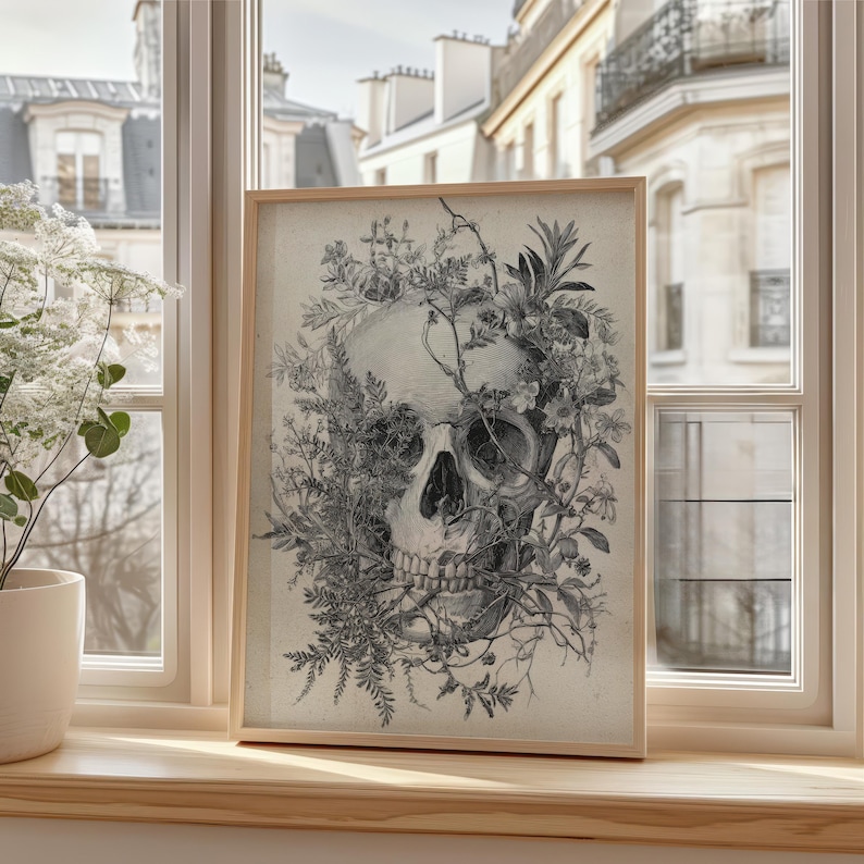 Vintage botanical art featuring a skull surrounded by ferns and climbing plants in an etching style.