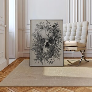 Antique style anatomy illustration of a skull with flowers growing through the eye sockets and jaw.
