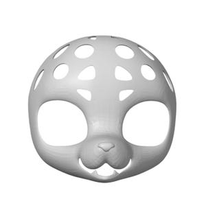 May include: A light grey, spherical, hollow mask featuring large circular cutouts across the top, two expansive eye openings, and a sculpted snout area with a small nose and two visible lower teeth, creating a stylised, animal-like facial structure.