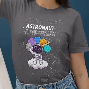 Camiseta de astronauta espacial para niños y adultos | Camiseta con dibujos de planetas y galaxias | Camiseta con gráfico de nubes del espacio exterior para amantes de la ciencia ficción