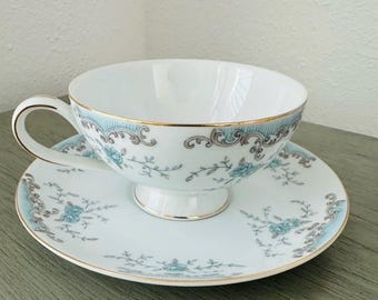 Taza y platillo de porcelana Imperial China Seville, estilo shabby chic cottagecore, azul y blanco.