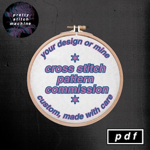 May include: A cross-stitch pattern commission is advertised on a white fabric stretched within a wooden embroidery hoop. The text reads "your design or mine, cross stitch pattern commission, custom, made with care." A small black circle with text and floral design is in the upper left corner.