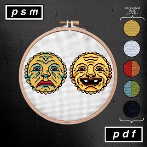 May include: Cross-stitch embroidery hoop featuring two yellow, pixelated faces with different expressions. One face is sad, the other is smiling. The design includes a color palette and the text "threaded DMC palette" and "pdf". The text "psm" is in the upper left corner.