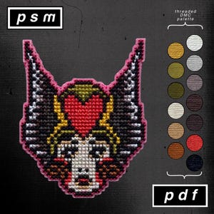 Könnte beinhalten: Ein Kreuzstich-Design mit einem Wolfskopf mit Herz und Flügeln, umrandet in Pink. Der Wolf hat ein rotes Herz, gelbes Haar und schwarz-weiße Details. Die Texte "psm" und "pdf" befinden sich in weißen Kästchen. Eine DMC-Palette wird angezeigt.