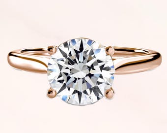 The warmth of a rose gold diamond ring, the interplay of light and shadow, love