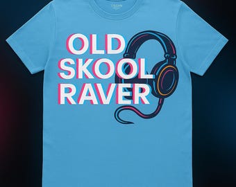 May include: Light blue t-shirt with the words "OLD SKOOL RAVER" in white, pink, and blue text. A graphic of a pair of headphones in black, pink, and orange is on the right side of the shirt.