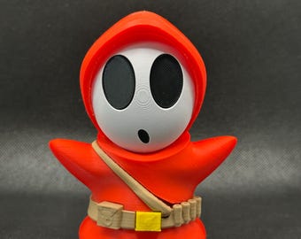 Figura impressa em 3D que mistura Jawa e ShyGuy – Arte colecionável de fã de Star Wars × Mario
