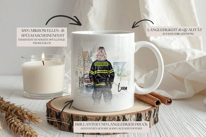 May include: White ceramic mug featuring a firefighter illustration. The mug has a handle and a printed design of a firefighter in uniform. The mug is on a wooden coaster with a lit candle and cinnamon sticks.