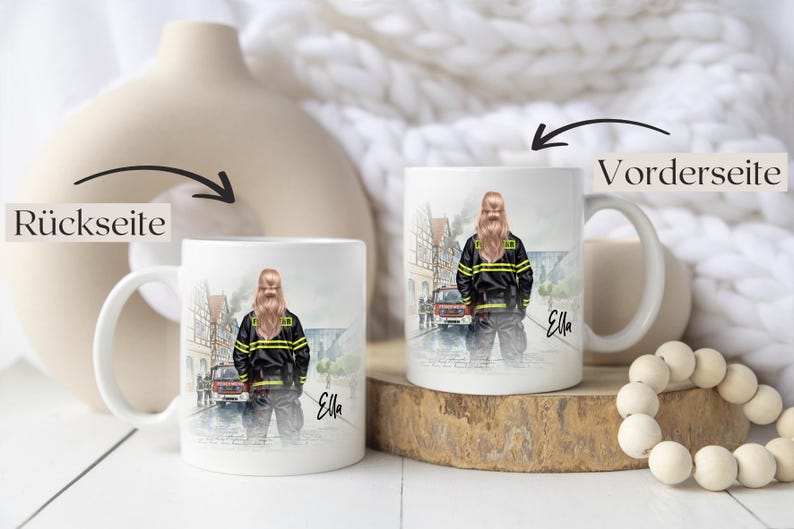 May include: White ceramic mug featuring a watercolor illustration of a firefighter in uniform, with the name "Ella" in script. The design includes a fire truck and a European town scene. The mug is displayed on a wooden surface.