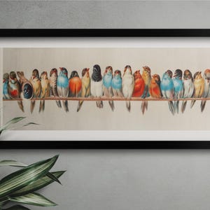 May include: A framed print featuring a watercolor illustration of a flock of colorful birds perched on a branch. The birds display a variety of colors, including blue, orange, and yellow. The artwork is set against a neutral background.