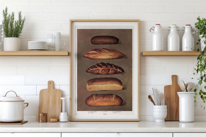 May include: A framed print featuring illustrations of various types of bread. The bread varieties are displayed in a vertical arrangement, showcasing their different shapes and crusts. The artwork is set against a neutral background, with a wooden frame.