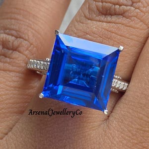 Blue Sapphire Princess Cut Gemstone Wedding Ring, High Profile Setting Hidden Halo Setting, Half Eternity Pave Set Silver Ring For Women