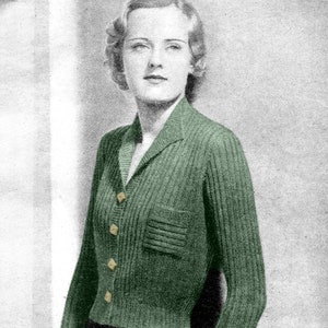 May include: A green knitted cardigan with a collared neckline and a single patch pocket on the left side. The cardigan has five buttons down the front.