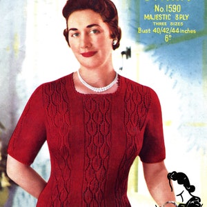 May include: A vintage knitting pattern for a red, short-sleeved sweater with a cable knit design. The pattern is called "Majestic 3 Ply" and is from Sirdar, No. 1590. The pattern is for three sizes: bust 40, 42, and 44 inches.