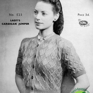 May include: A vintage knitting pattern for a cardigan sweater. The pattern is from the HEMA brand and is for a lady's cardigan jumper. The pattern is for a sweater with a diamond pattern and short sleeves. The pattern is from the 1940s.