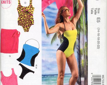 May include: McCall's sewing pattern M6759 for swimwear. The pattern includes options for a one-piece swimsuit with a yellow and black color block design, a leopard print swimsuit, and other separates. The pattern size is E5 (14-16-18-20-22).