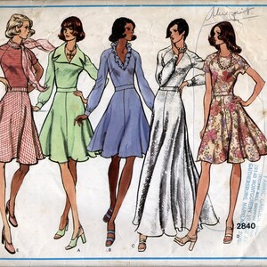 May include: A vintage sewing pattern for four different dresses. The pattern is for Vogue's Basic Design and is number 2840. The dresses are all different styles and colors, including a red and white gingham dress, a green dress, a blue dress, and a white dress.