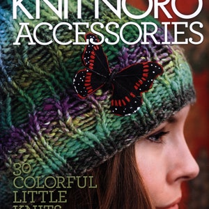 May include: A close-up of a woman wearing a green, purple, and black knitted hat with a black butterfly embellishment. The hat is made with a colorful yarn and has a textured knit. The text "30 COLORFUL LITTLE KNITS" is printed below the hat.