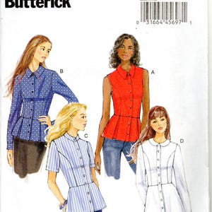 May include: A Butterick sewing pattern, B6097, featuring illustrations of four different blouse designs. The blouses include a red sleeveless top, a blue polka dot long-sleeve shirt, a blue and white striped short-sleeve shirt, and a white long-sleeve shirt.