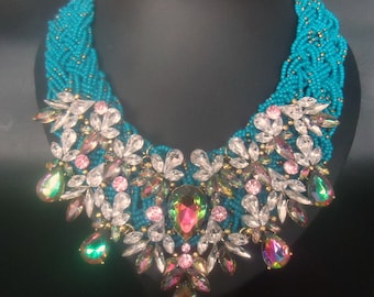 Braided Czech Turquoise Beaded Necklace Embellished with Bib of Watermelon Heliotrope and Ice Stones.  Opulent and Dramatic Artisan