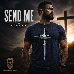 May include: Dark blue t-shirt featuring the text "SEND ME" and "ISAIAH 6:8" in white. A white cross graphic is centered on the shirt. The Bearded Daddy logo is visible at the bottom left.