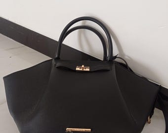 Elegant Black Structured Handbag with Gold Accents