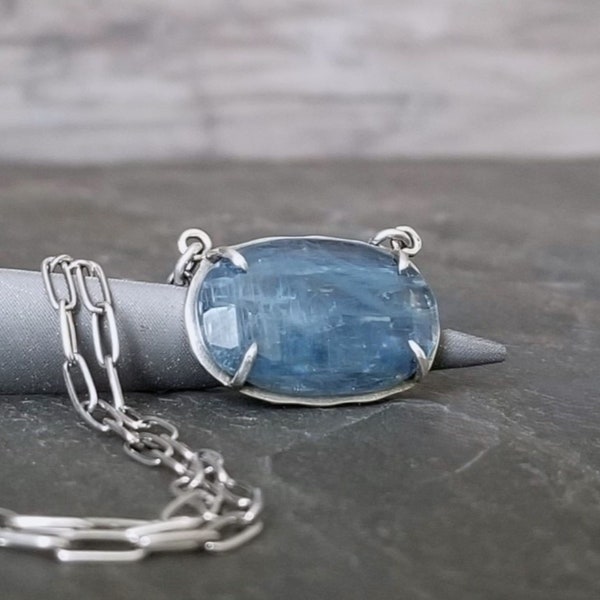 Blue kyanite pendant necklace with lightly oxidized sterling silver paperclip chain, sideways oval pendant