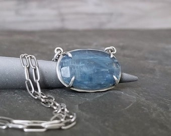 Blue kyanite pendant necklace with lightly oxidized sterling silver paperclip chain, sideways oval pendant